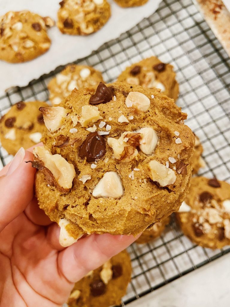 close up brown butter pumpkin chip cookie with cranberry