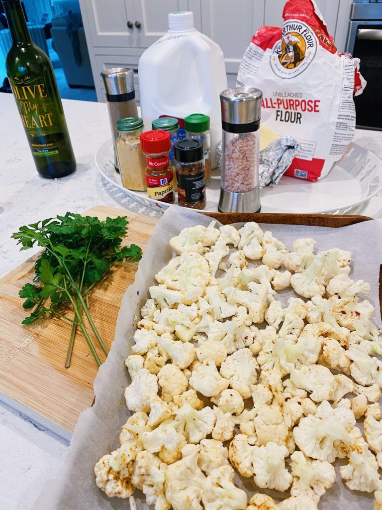 cheesy cauliflower bites on tray