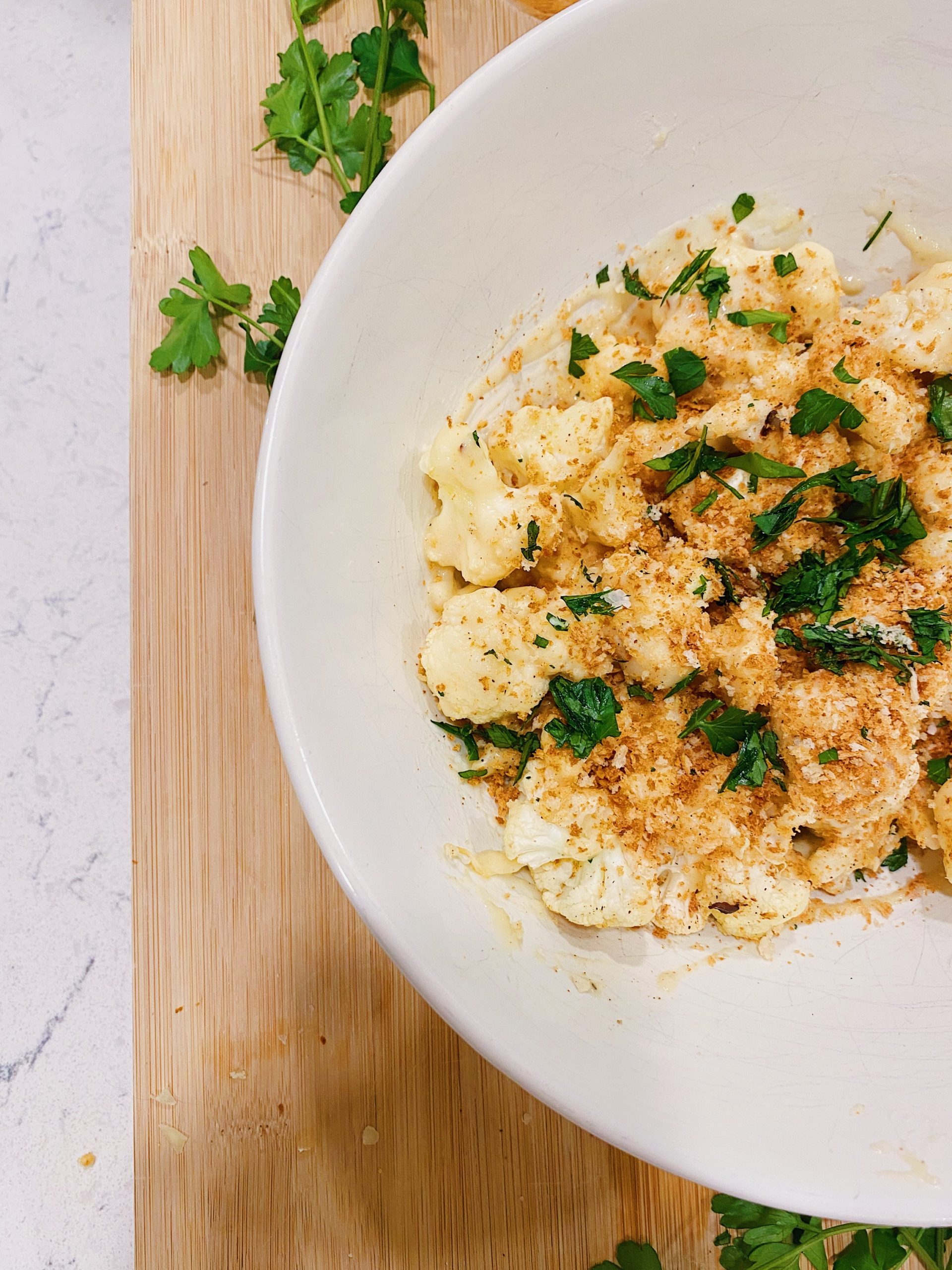 finished cheesy cauliflower bites garnished cheese sauce cauliflower mac and cheese