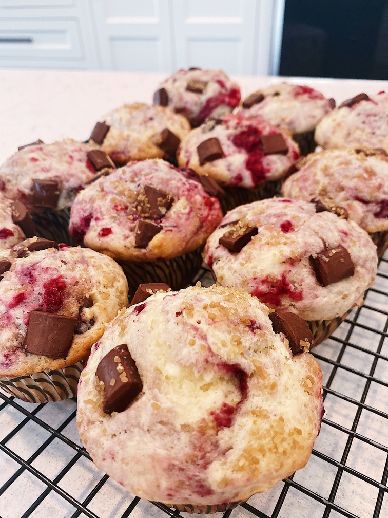 raspberry chocolate muffins on rack